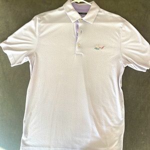 Greg Norman size medium golf shirt. Gently warn